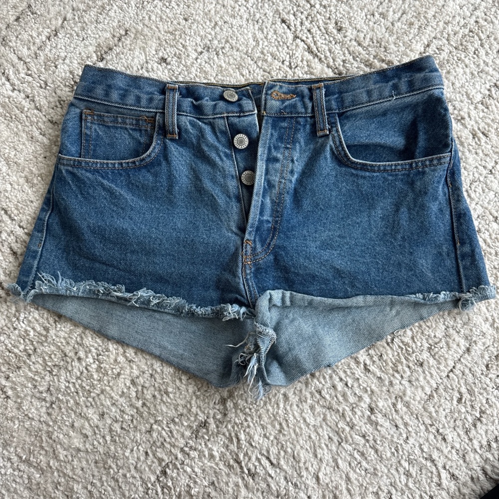 Brandy Melville High-Rise Raw Hem Denim Shorts in Blue